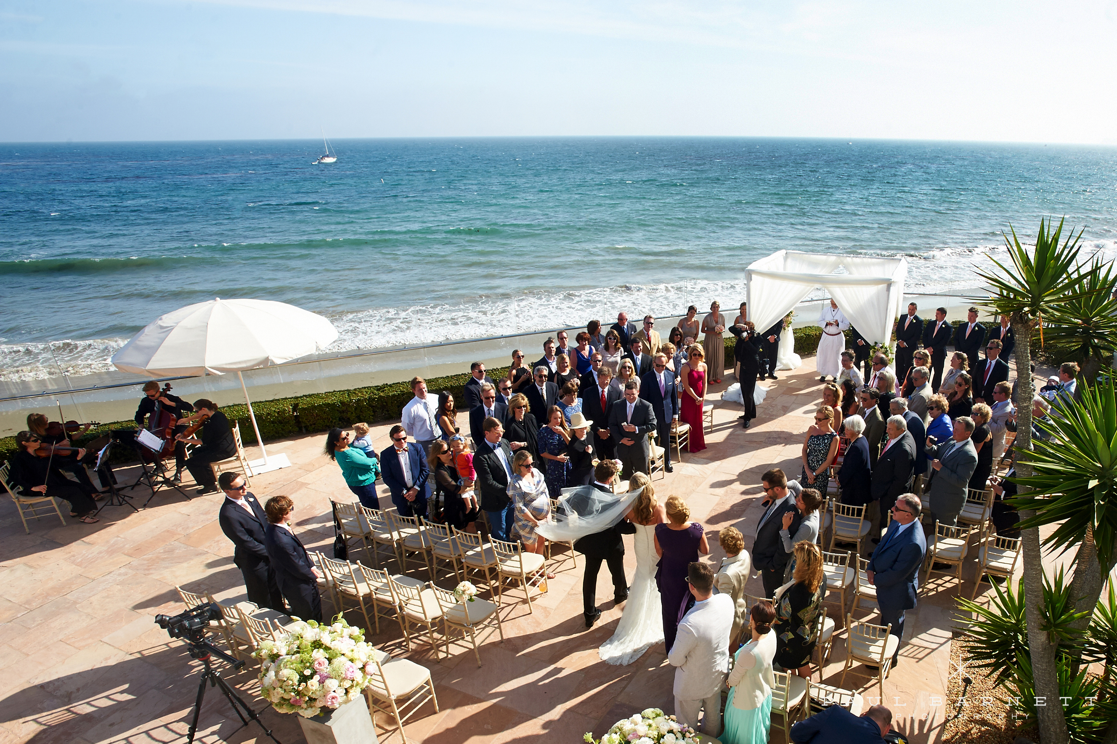 Oceanfront wedding ceremony at the Coral Casino in Santa Barbara
